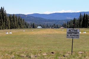View from the north end of the Seeley Lake Airport runway from Cottonwood Lakes Road.  Seeley Lake, MT